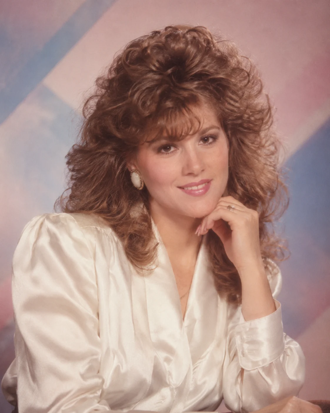 Original AI-generated example of a fictional adult 1987 mall glamour portrait against a pastel studio backdrop.